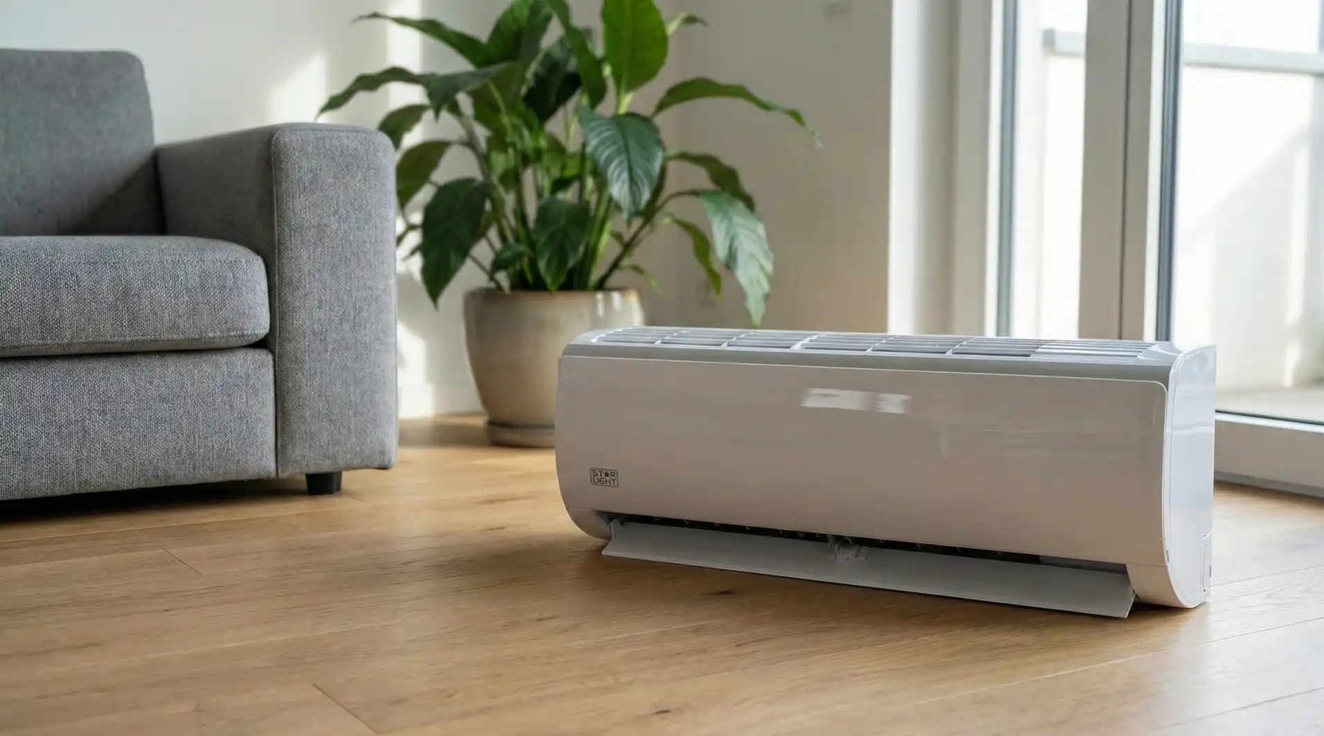 Aparat aer condiționat Star-Light ACM-12FOWF montat pe perete alb